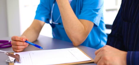 Doctor and patient discussing complaint